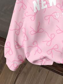 SHEIN Leap Crew 美国纽约少女复古可爱甜美粉色蝴蝶结印花芭蕾舞风格奶油粉色返校季Y2K风休闲简约长袖卫衣，宽松厚实版型，适合秋冬季节、圣诞派对、街头风、居家穿着。 - 彩色 - 查看 4