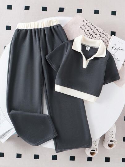 青少年女孩灰色短款上衣搭配休闲长裤