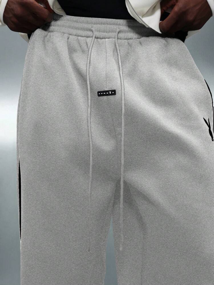 PLAYBOY X SUMWON Wide Leg Drop Crotch Joggers With Side Stripe