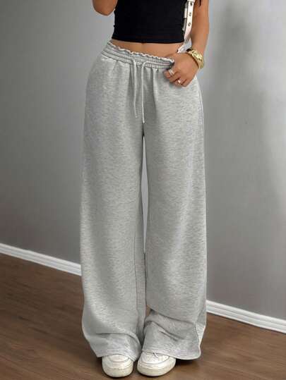 SHEIN Tonårsflickor Casual Loose Fit Låg Midja Resårband Vida Ben Träningsbyxor, Lämpliga För Vår, Sommar, Höst Och Vinter