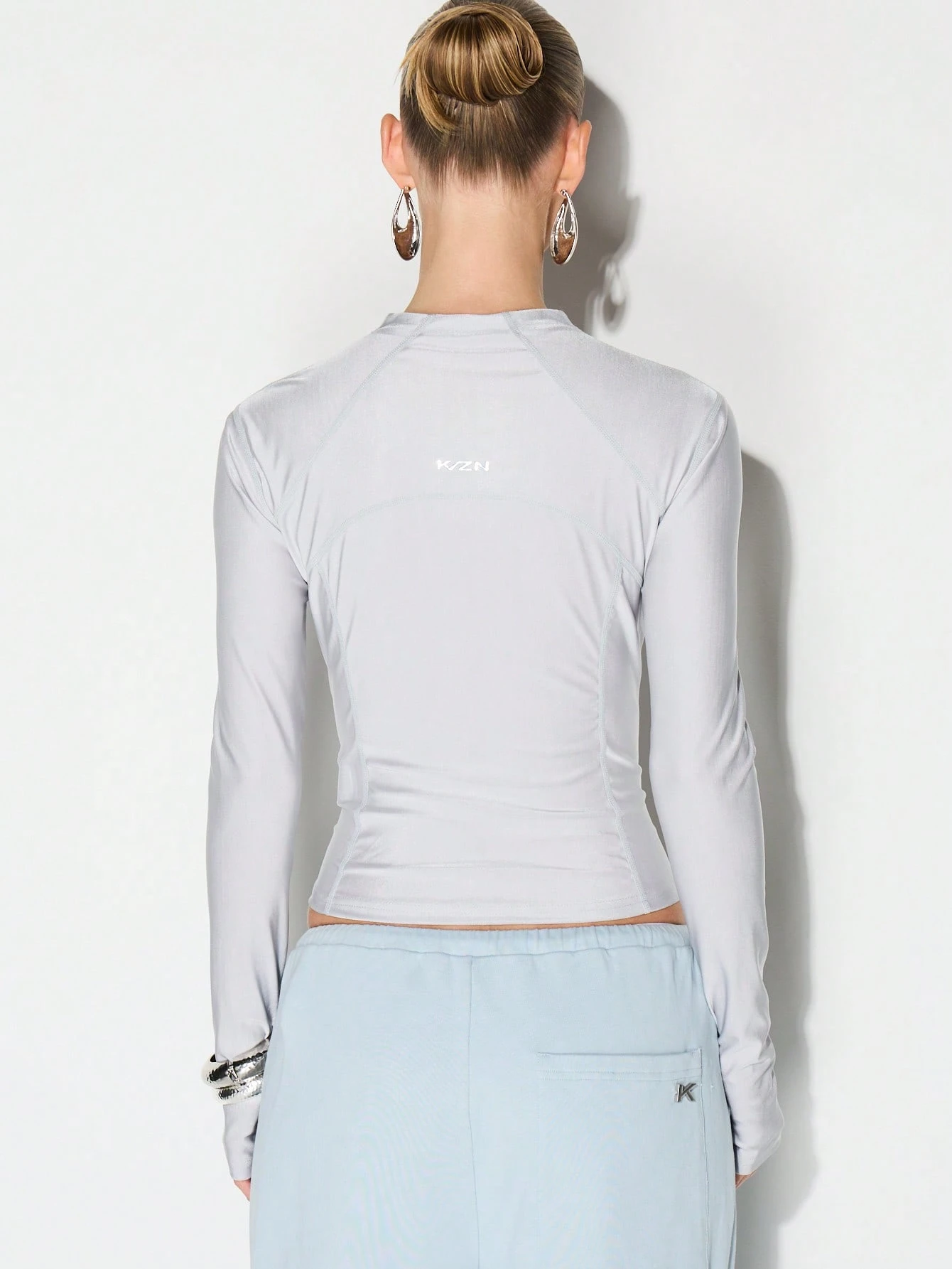 KIZN Top sportivo con zip intera e maniche lunghe