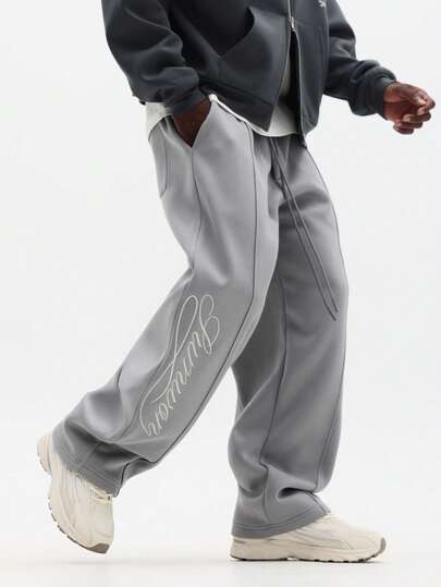  SUMWON 宽松版型运动裤，饰有同色系刺绣细节，抽绳腰带，休闲日常居家服，纯色