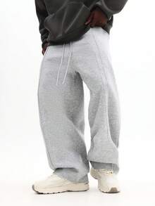 Quần nỉ SUMWON dáng rộng thoải mái với bo chun ở gấu quần, thích hợp mặc ở nhà và thư giãn cuối tuần. Màu trơn. - Màu Xám nhạt - Xem 1