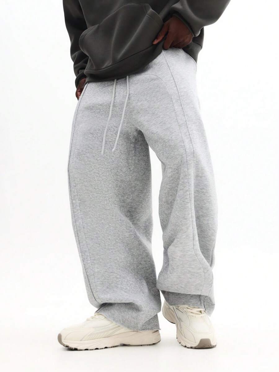 Quần nỉ SUMWON dáng rộng thoải mái với bo chun ở gấu quần, thích hợp mặc ở nhà và thư giãn cuối tuần. Màu trơn. - Màu Xám nhạt - Xem 1