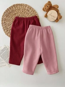 SHEIN 2条装女婴灯芯绒纯色保暖内衬弹力腰裤，适合室内、户外滑雪、日常穿着、运动、玩耍、聚会、摄影、圣诞节及秋冬季其他场合。 - 彩色 - 查看 2