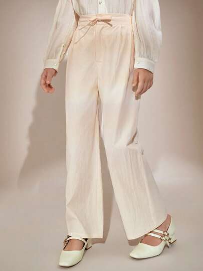 Girls' Beige Loose-Fit Pants: Versatile Casual Bottoms For Big Tween Girl Soft Fabric, Drawstring Waist. Ideal For School, Weekend Hangouts, Family Trips Or Layered Outfits. Pairs Effortlessly With Shirts, Sweaters Or Jackets-Comfortable & Stylish For Daily, Casual Occasions.