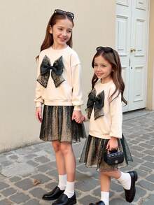 SHEIN Serisse Kids 少女3D豹纹蝴蝶结装饰圆领长袖卫衣裙，搭配全豹纹网纱下摆，适合秋冬季日常穿着 - 杏色 - 查看 12