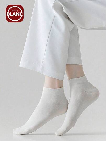 7 双纯色简约女士中筒袜