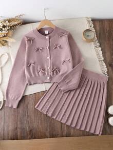 Conjunto de suéter para niñas preadolescentes, suéter de punto hecho a mano con cuello redondo, botones, manga larga y lazo a juego + falda mini plisada del mismo color, corte holgado, suave y cómodo, adecuado para primavera/otoño, uso diario, exterior, viajes, vacaciones, hogar y juegos de niños