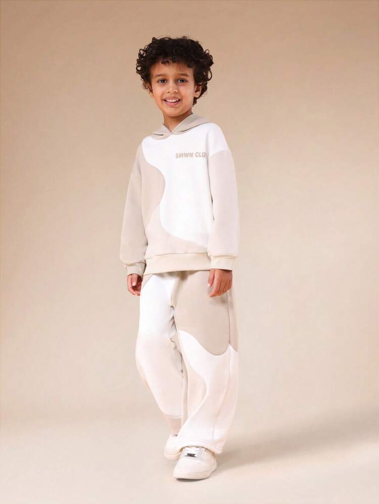 Komplet z kapturem i spodniami dresowymi z nadrukiem fal