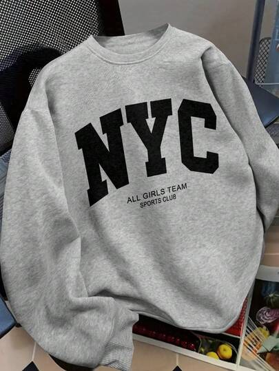 Manfinity 男士休闲标语印花圆领长袖宽松套头卫衣，秋冬款