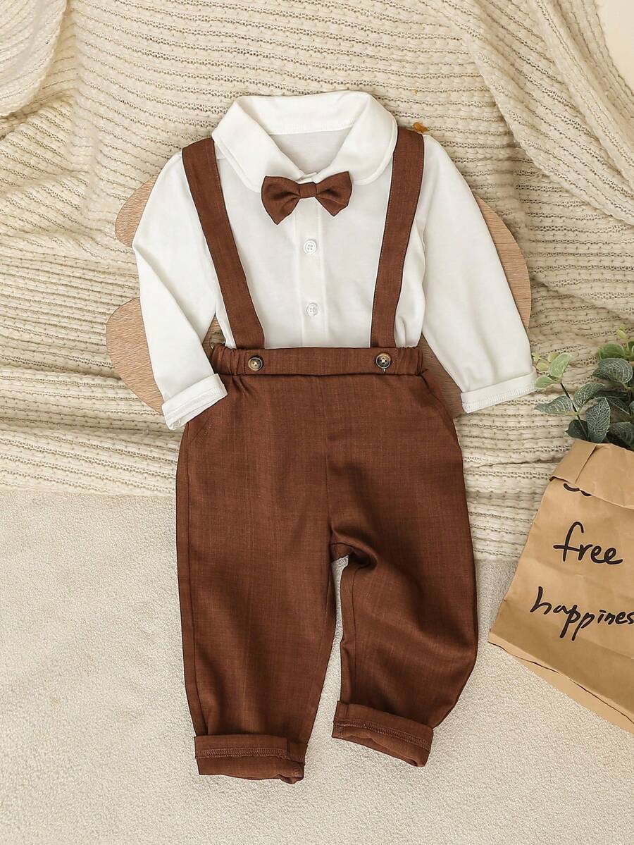 SHEIN 两件套男婴可爱绅士风正式套装，包括白色长袖领衬衫（带蝴蝶结）和休闲背带裤，时尚优雅帅气，适合生日派对、庆典、演出、婚礼、迎婴派对、洗礼等正式场合，春秋季穿着。 - 咖啡棕 - 查看 1