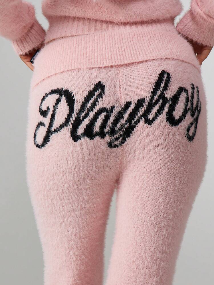 Missguided x Playboy Puszyste dzianinowe spodnie do jogi z rozszerzaną talią i ozdobnym napisem