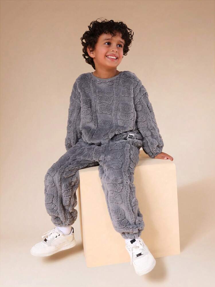 Sudadera con capucha de sherpa y pantalones deportivos a juego