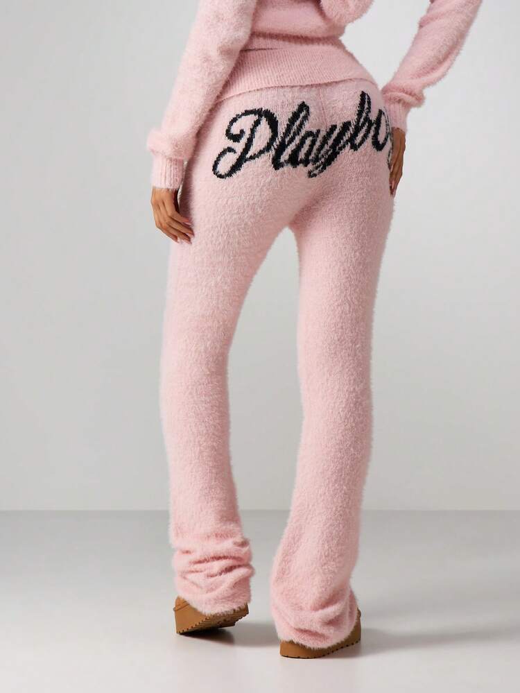 Missguided x Playboy Puszyste dzianinowe spodnie do jogi z rozszerzaną talią i ozdobnym napisem