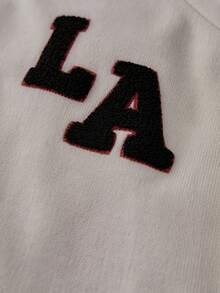 EURMUSE LA Varsity Knit Co-Ord Set With Striped Sleeves – & Black