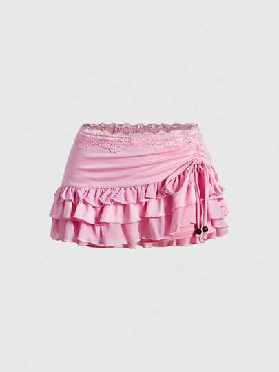 Grunge Punk Jupe mini sexy à taille basse avec volants, nœud et imprimé léopard, garniture de dentelle vintage. Idéale pour les femmes lors des festivals de printemps, concerts et Saint-Valentin