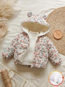 1件女婴冬季拉链长袖数码印花羽绒服，适合户外旅行，提供充足的保暖保护，时尚实用，让宝宝在冬季探险中既温暖又时尚。