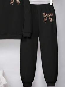 SHEIN Leap Crew 复古甜美豹纹蝴蝶结印花，黑色，少女休闲宽松圆领舒适长袖套头卫衣和运动裤两件套，适合秋冬季节、街头风、校园休闲运动、户外野餐、郊游、街头摄影、居家、校园穿着。 - 彩色 - 查看 8