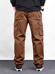 Manfinity Homme 男士纯色休闲裤 男士 Amekaji 风格锈棕色阔腿长拉链工装裤，采用平纹梭织面料，适合休闲穿着 男士休闲锈棕色阔腿工装裤，拉链细节梭织面料长款 Amekaji 风格 Rust 的平纹梭织面料阔腿长拉链工装裤休闲 Amekaji 风格，适合秋季