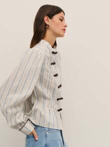 Nöista Elegant Striped Blouse-Style Jacket With Contrast Black Fastenings And A Tailored Fit. A Sophisticated Piece That Blends Modern Chic With Timeless Detail. - Baby Blue - View 3