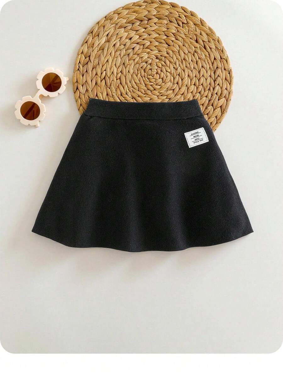 SHEIN Baby Girl Cute Black Letter Pattern Knitted Skirt, Versatile For Autumn/Winter