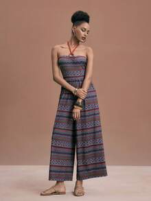 JIAN LASALA Macacão feminino boho de malha, sem mangas, com estampa multicolorida, decote halter com argola, pernas largas e estilo elegante para Ibiza. Trajes africanos para mulheres, roupas africanas femininas, looks caribenhos para mulheres, macacão estampado, macacão boho feminino, macacão de praia feminino, macacão tomara que caia feminino, macacão boho feminino, macacão cropped, macacão feminino de pernas largas para praia e casamento. - Multicolorido - Ver 1