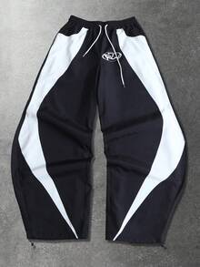 ROMWE MEN Pantalones deportivos casuales de hombre con diseño de parches de color contrastante y bajo curvo - Negro - Ver 1