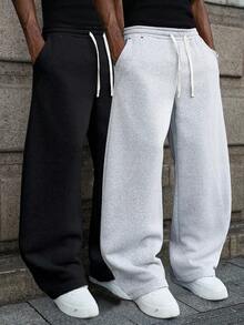 Manfinity EMRG Quần nỉ nam dáng rộng thoải mái, quần baggy, quần thể thao, chạy bộ, quần nỉ phong cách đường phố đa năng, phù hợp cho trang phục đường phố, trang phục thường ngày, đi chơi cuối tuần, lễ hội âm nhạc, tụ tập xã hội, v.v. Chiếc quần này là một món đồ đa năng thiết yếu trong tủ đồ của nam giới, là món quà tuyệt vời cho bạn trai hoặc chồng. Quần nỉ quá khổ Quần nỉ rộng cho nam Quần nỉ Pro Club Quần nỉ rộng màu xám - Nhiều màu - Xem 5