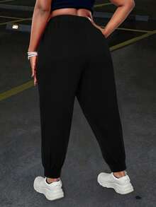 Calvaya Quần dài túi thường ngày buộc nơ phía trước họa tiết bướm cỡ lớn - màu đen - Xem 2