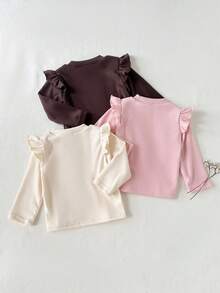 SHEIN Bộ 3 áo dài tay cổ tròn thêu hình trái tim hai mặt bằng vải nỉ mềm mại, thoải mái cho bé gái, thích hợp mặc thường ngày, ở nhà, chơi ngoài trời vào mùa thu/đông, đa năng. - Nhiều màu - Xem 2