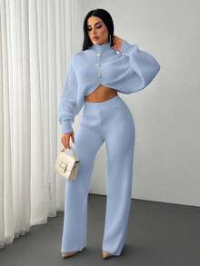 EURMUSE 2 Pieces Ribbed Knit Lounge Set Featuring Asymmetrical Sweater With Decorative Bow Accents And Matching High-Waisted Pants - Baby Blue - View 3