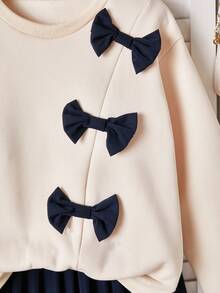 Sparklyn 2pcs Tween Girls Outfit: Bow Accent Apricot Long Sleeve Sweatshirt & Black Pleated Mini Skirt Set, Suitable For School, Casual, And Outings, Spring/Autumn - Multicolor - View 5