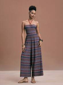 JIAN LASALA Macacão feminino boho de malha, sem mangas, com estampa multicolorida, decote halter com argola, pernas largas e estilo elegante para Ibiza. Trajes africanos para mulheres, roupas africanas femininas, looks caribenhos para mulheres, macacão estampado, macacão boho feminino, macacão de praia feminino, macacão tomara que caia feminino, macacão boho feminino, macacão cropped, macacão feminino de pernas largas para praia e casamento. - Multicolorido - Ver 4