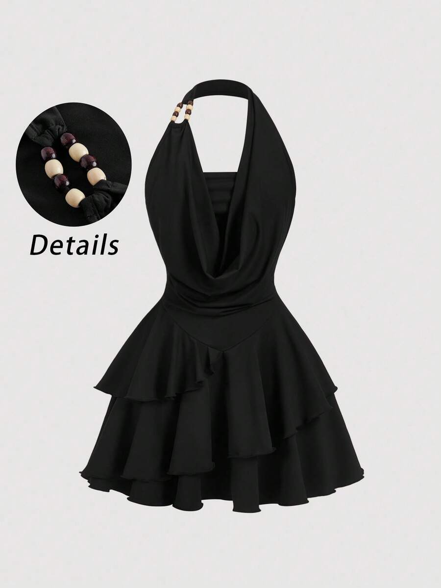 SHEIN MOD Váy ngắn bất đối xứng cổ điển thập niên 70 cỡ lớn với chi tiết xếp nếp, cổ yếm, trang trí hạt cườm, viền bánh nhiều lớp và cổ áo xếp nếp - Lấy cảm hứng từ Y2K, hoàn hảo cho kỳ nghỉ trên đảo, tiệc tùng, hẹn hò, tiệc sinh nhật, tiệc trà chiều và lễ hội! - màu đen - Xem 1