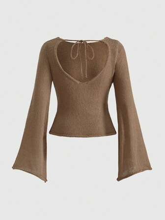 Top a maglia aderente da donna con maniche a sbuffo, design senza schienale e lacci