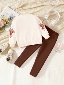 2 Stück/Set Lässiger modischer Cartoon Tasse & Ballett Mädchen Herz Grafik Muster Outfit für Kleine Mädchen, beiger Rundhals Sweatshirt und schwarze Leggings, warmer & bequemer personalisierter Anzug für Mädchen im Herbst/Winter