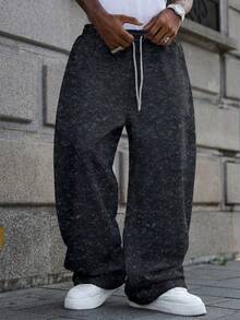 Manfinity Hypemode 男士休闲宽松运动裤，适合日常休闲穿着、周末外出、朋友聚会、旅行和其他轻松的社交活动。这款裤子是男士衣橱中不可或缺的百搭单品，也是送给男友或丈夫的绝佳礼物。 - 黑色 - 查看 3