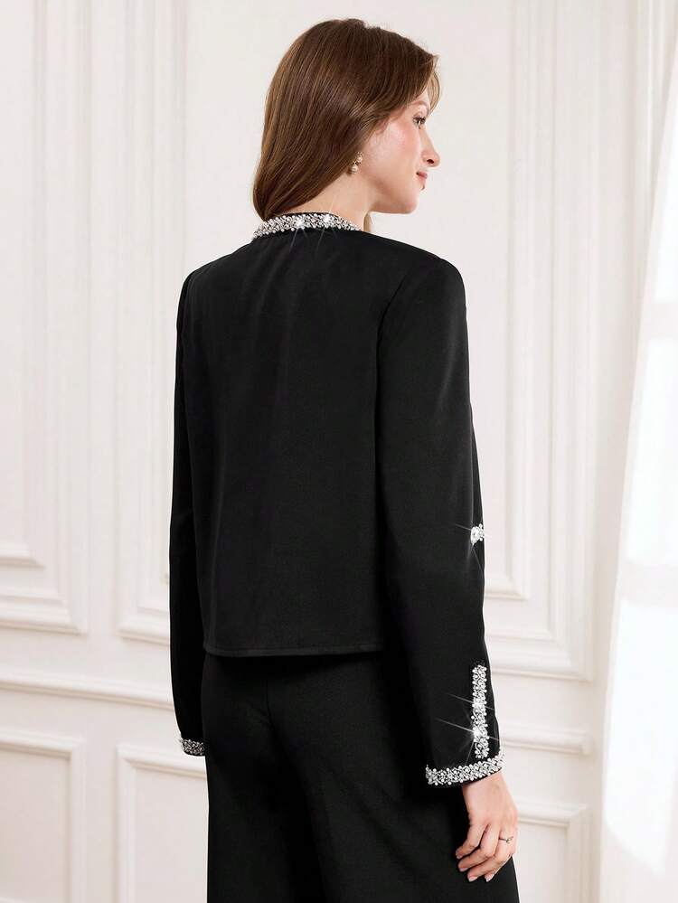 This Elegant Women's Autumn/Winter Coat Features Silver Rhinestone Trim, Sparkling And Eye-Catching With A Touch Of Sophistication. The Classic Black Paired With Silver Rhinestones Creates A Sophisticated And Sophisticated Look That's Sure To Turn Heads. Perfect For Autumn And Winter, This Coat Is Also A Great Choice For New Year's, Showcasing A Glamorous Style. Ideal For New Year's Fashion Parties, Upscale Gatherings, And Any Occasion Requiring A Striking Look.