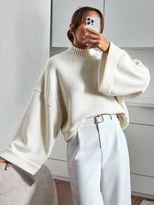 EURMUSE Chic Black Batwing Sleeve Knit Sweater With Relaxed Oversized Fit And Effortless Minimalist Elegance - White - View 1