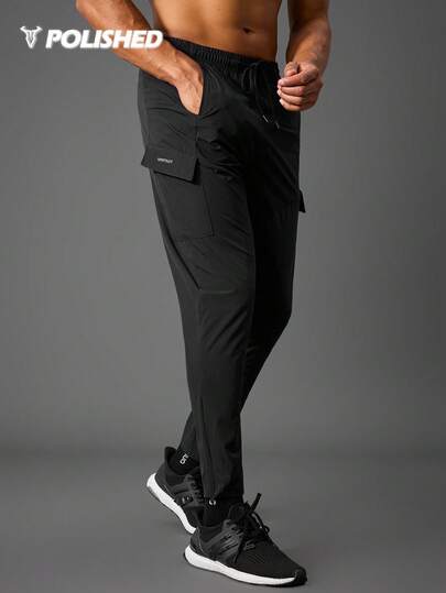 Manfinity Acti Log Boyfriend Style Men Drawstring Waist Flap Pocket Side Sports Pants Fall Fall Breathable Sweat-Wicking Lightweight Comfortable Running Muscle Minimalist Design Slim Fit For Workout Joggers Gymwear