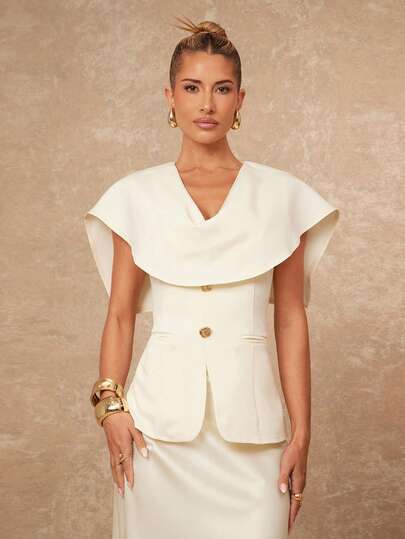 Lumalex Women's Elegant Apricot Deep Draped Neck Design Lapel Cape, Faux Pocket Design, Metal Decor Button, Sleeveless Fitted Jacket, Ivory Sculpted Cape‑Overlay Peplum Top With Soft Drape V‑Neckline, Elegant Caped Shoulder Silhouette, Tailored Fitted Waist, Structured Peplum Hem, Double Decorative Gold Button Front Closure, Subtle Welt Pocket Detailing, Clean Back Seaming, Smooth Woven Fabric Finish & Refined Modern Power‑Dressing Aesthetic, Perfect For Summer, Spring-Break Trips, Cruises, Beach Weekends, Vacations, Parties, Date Nights, Weddings, Proms, Banquets, Birthdays, Carnivals, Festivals (Including Al-Adha), And Other Holiday Events. Showcases Romantic Valentine Vibes, Neo-Girly Charm, Boho-Casual Flair, Quiet Luxury, Business Chic, And Relaxed Vacay Elegance, A Richly Layered, Glitter-Accented Style For Luxury Proms, Receptions, Banquets, Weddings, Raves, Festivals, Holiday Gatherings, Outdoor Evening Occasions-Ideal, Party Looks