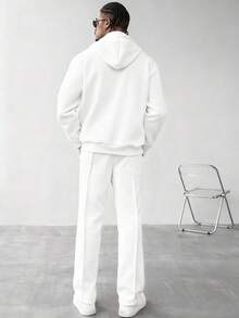 Manfinity Homme Bộ áo hoodie và quần dài màu trơn tối giản dành cho nam, bộ đồ thể thao màu trắng dành cho nam, bộ đồ phối hợp dành cho nam, bộ đồ thể thao 2 mảnh màu trắng dành cho nam, bộ quần dài màu trắng dành cho nam. - trắng - Xem 2