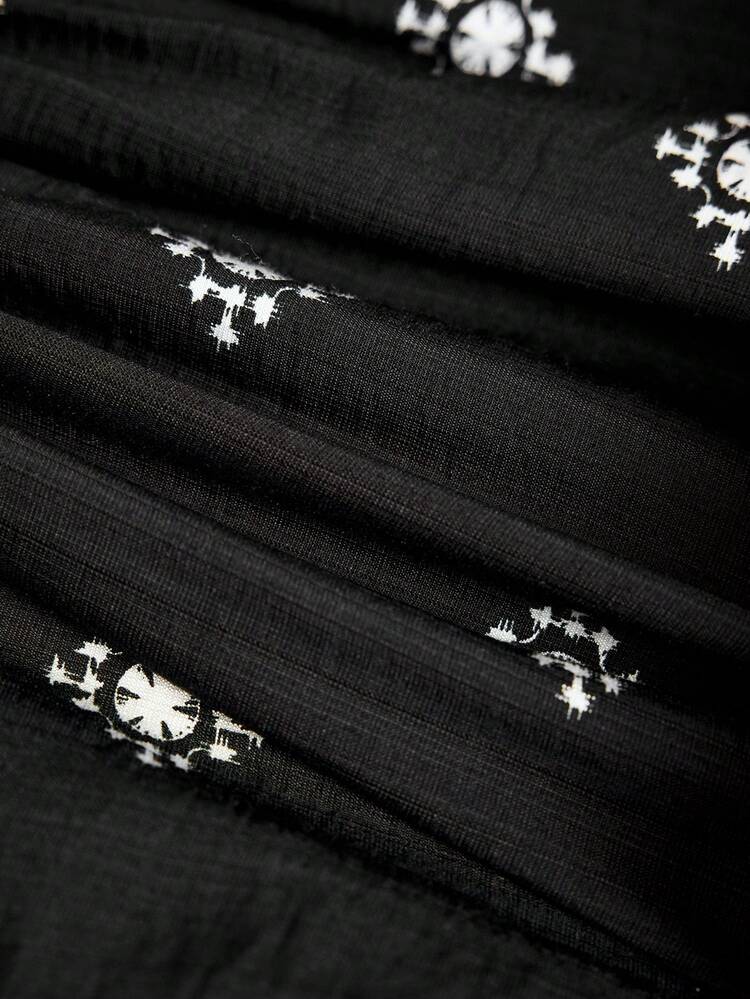 This Elegant Women's Blouse Features A Classic Black And White Color Block Design, Perfectly Matching The Sophisticated Atmosphere Of The New Year. The Geometric Embroidered Pattern Adds A Touch Of Retro Style With A Modern Twist. The V-Neck, Lantern Sleeves, And Fitted Waist With A Flared Hem Create A Relaxed Yet Dynamic Silhouette, While The Embroidered Details Add A Touch Of Luxury. Suitable For Spring And Autumn, It Can Be Paired With Black Trousers For A Sharp Look Or Layered With A Jacket For Added Depth. Perfect For Casual Gatherings Or Everyday Outings, This Blouse Showcases Unique Taste With Its Resort-Inspired Print And Fashionable Style With Its Contrasting Colors. It's A Versatile Piece That Combines Personalized And Quality For Your New Year's Wardrobe.