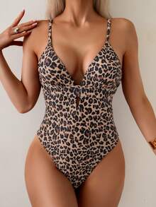SHEIN Traje de baño de una pieza sexy de mujer con estampado aleatorio de leopardo y diseño de escote en V profundo, para verano