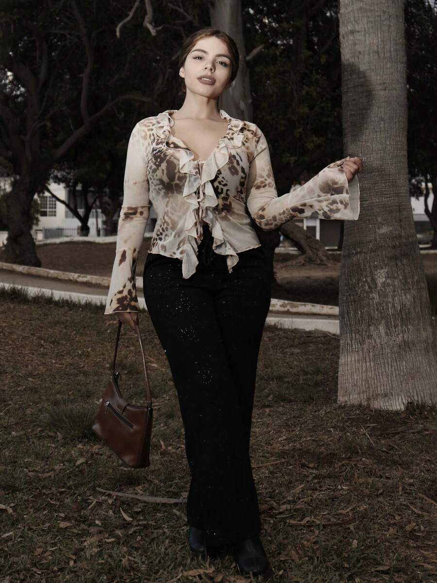 Lupita Cardoza Pantalones rectos de talle elástico y pierna ancha con estampado estrellado plateado de uso casual - Negro - Ver 1