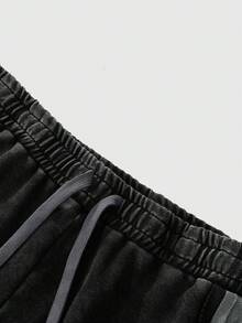 Manfinity EMRG 男士休闲宽松棉质运动裤，街头风，简约设计，松紧腰带，做旧面料，适合日常穿着、休闲、时尚、街头风格，也是节日礼物的理想之选。 - 黑色 - 查看 3