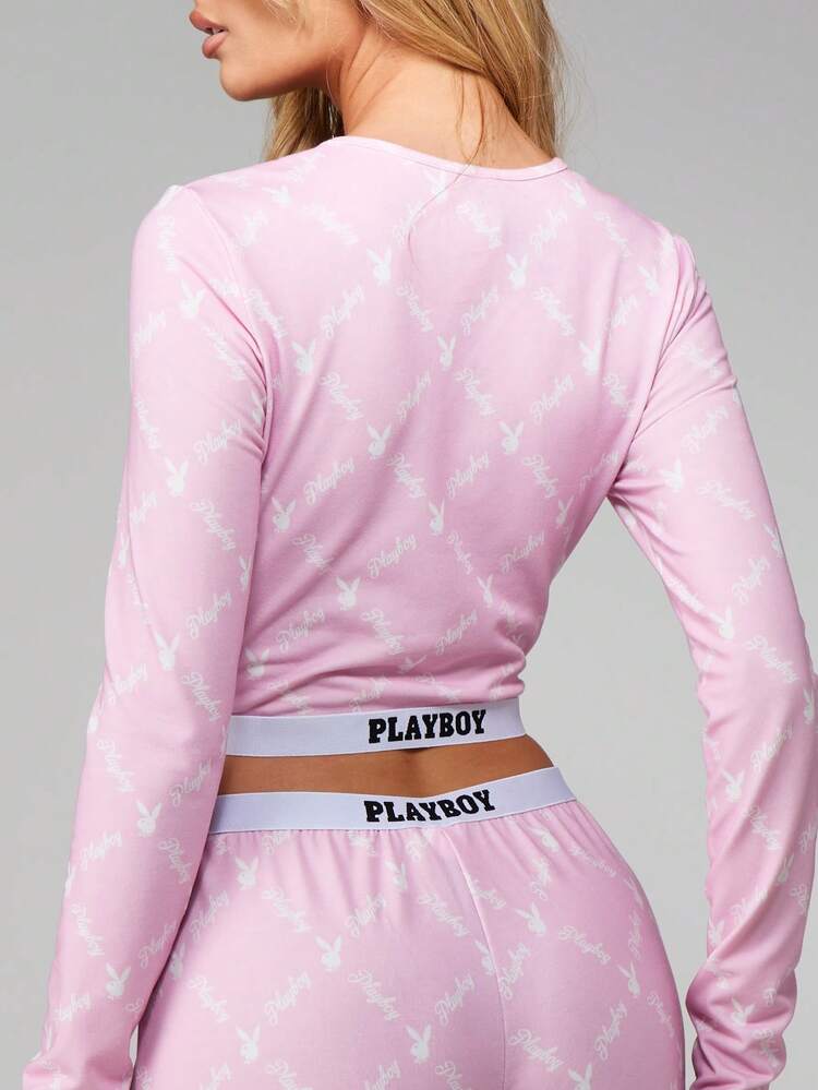 Missguided x Playboy Set pigiama con top corto a maniche lunghe e pantaloni a gamba ampia con stampa di coniglietti