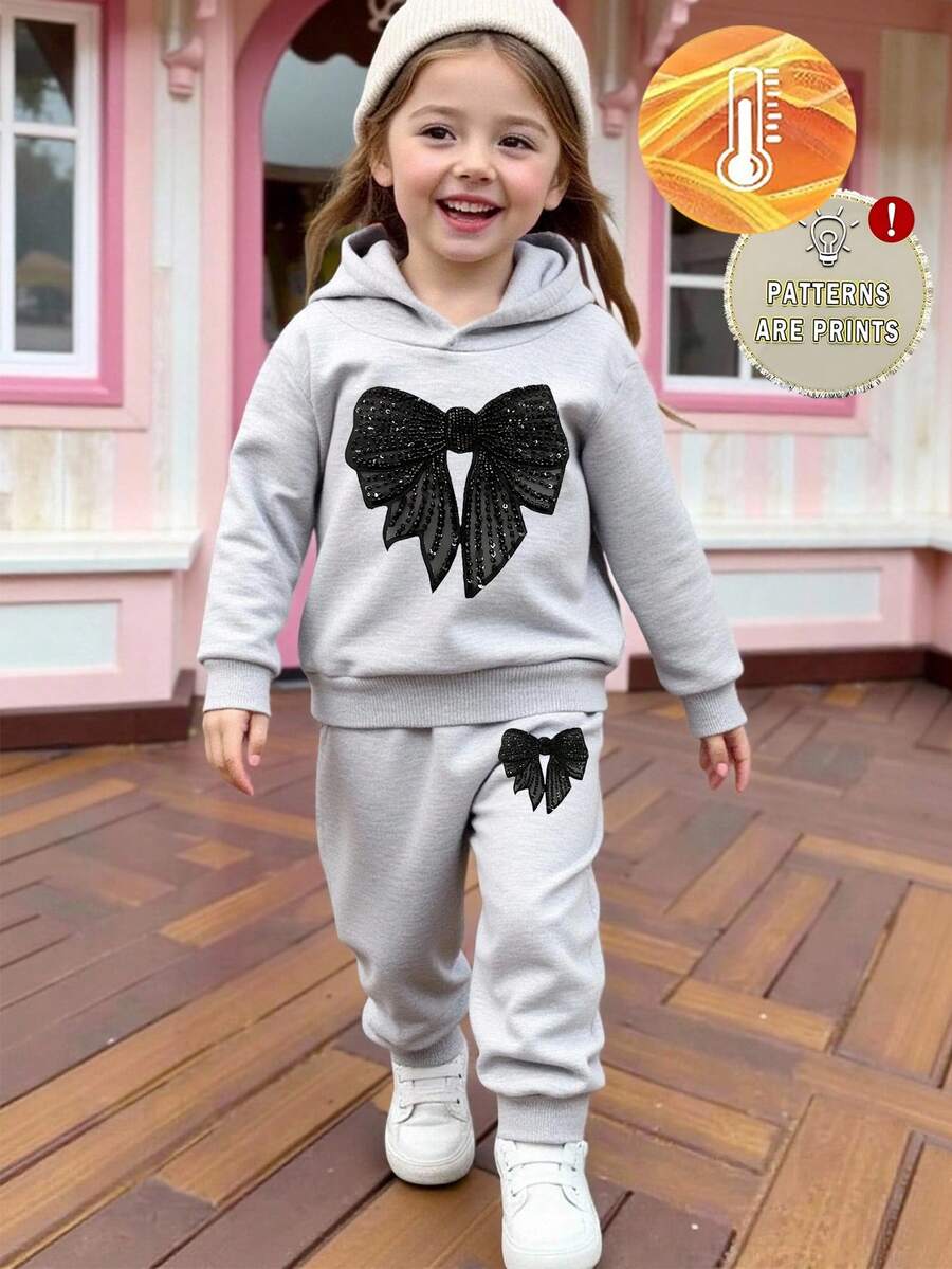SHEIN Playful Pals 两件套女婴套装,时尚甜美蝴蝶结装饰,亮片印花长袖连帽卫衣和蝴蝶结印花运动裤,适合秋冬季外出穿着。 - 灰色 - 查看 1