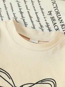 SHEIN 2 pièces Ensemble extérieur pour bébé fille avec Top t-shirt décoré d'un nœud mignon et pantalon en jean, printemps/automne